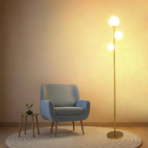Fiqevs 3 globe floor lamp with gold base offers stable, stylish lighting for living rooms.
