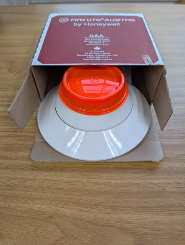 Fire-Lite SD365 front view showing compact detector for homes and businesses.