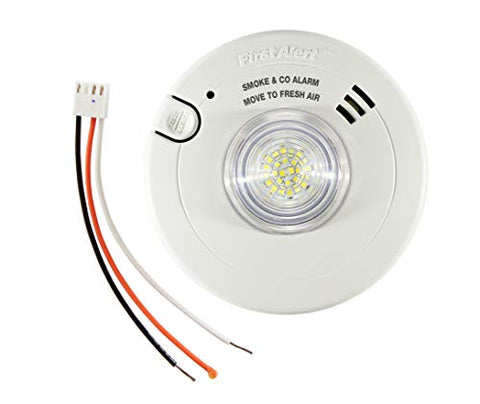 Packaging box for First Alert BRK 7030BSL showcasing safety features.