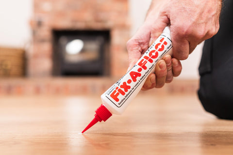 Fix-A-Floor injection during repair demonstrates quick, strong adhesion