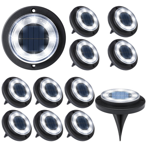 Flacchi solar ground light disk along a walkway showing cool white glow for safe paths