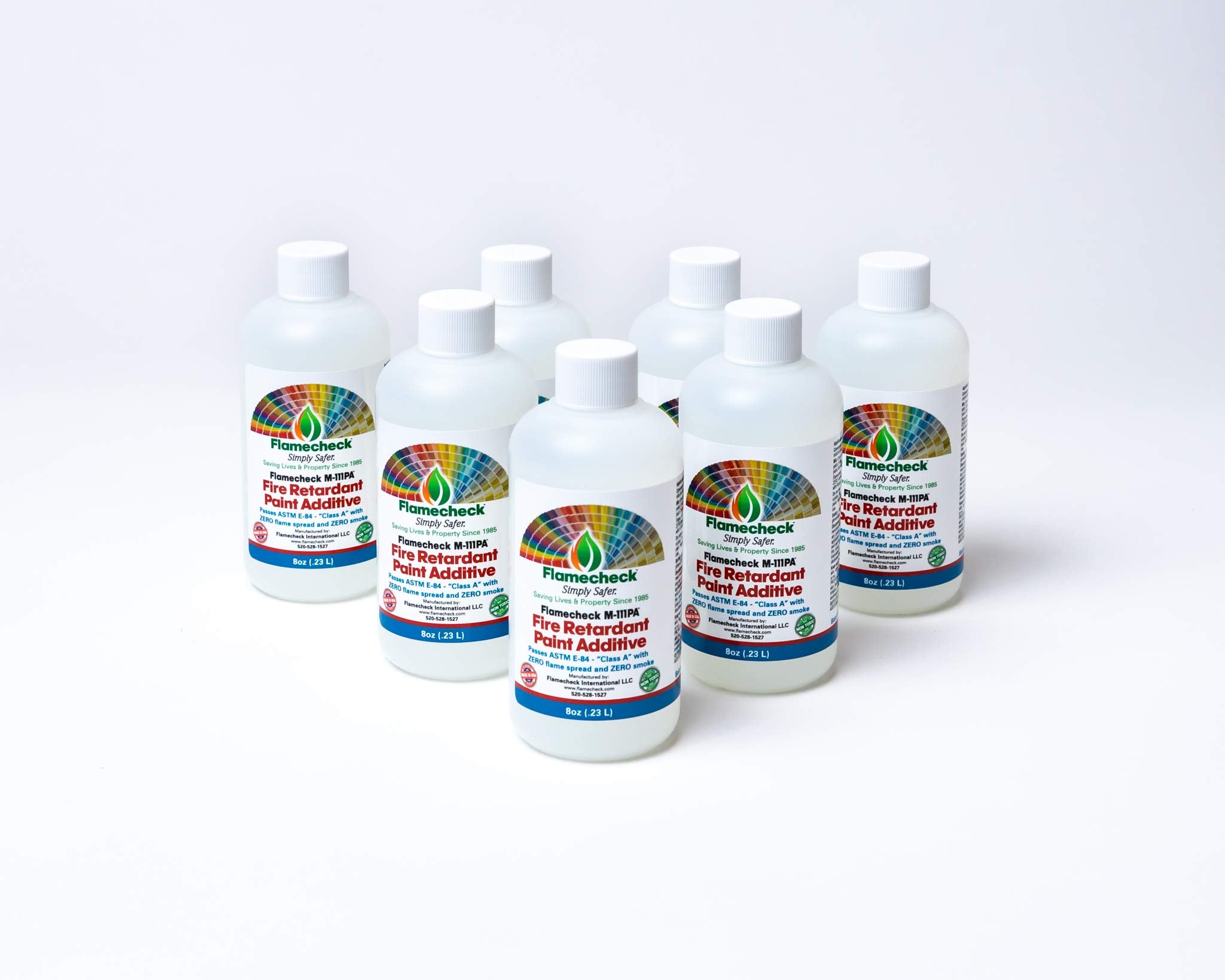 Flamecheck M-111PA being poured into a gallon of latex paint for easy mixing