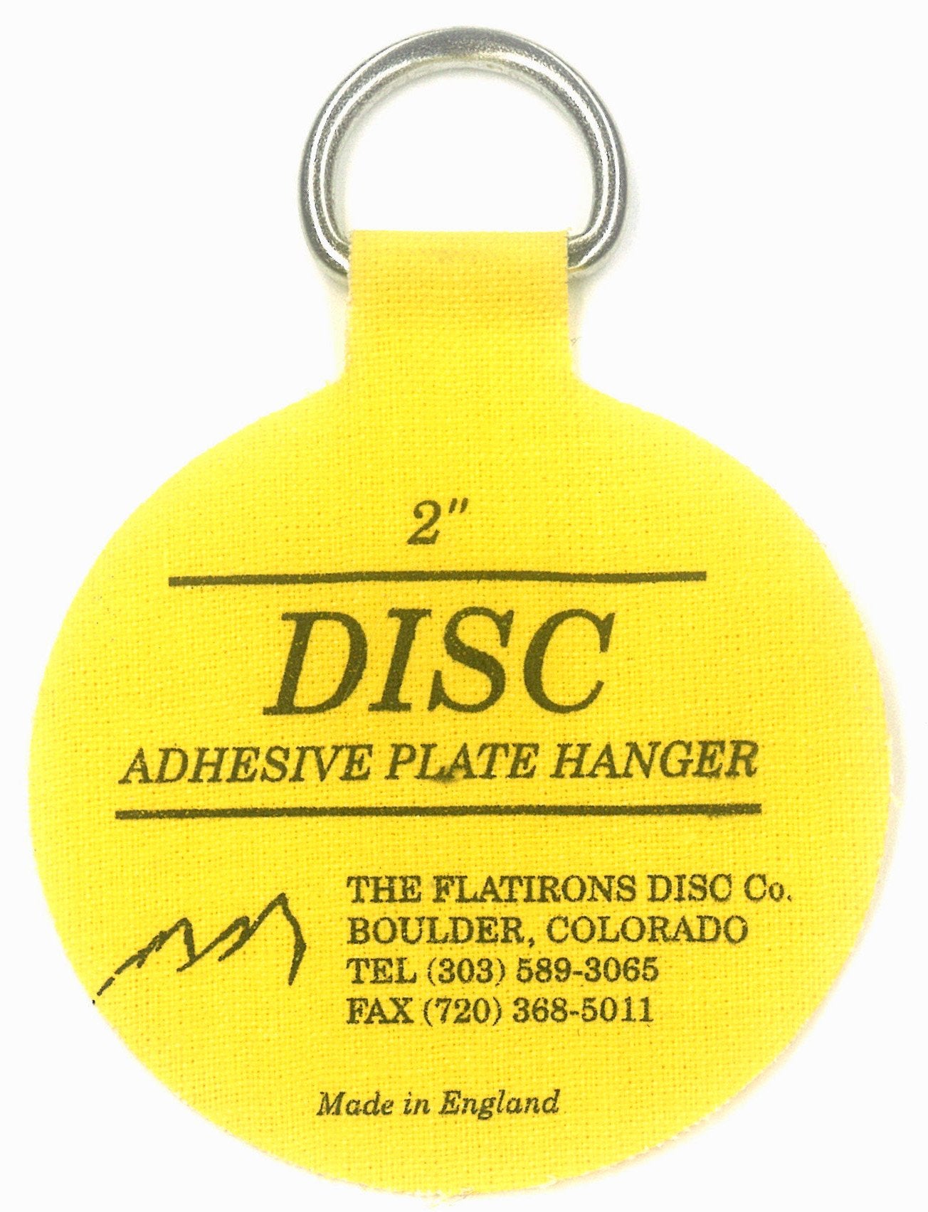 Flatirons Disc adhesive plate hangers on wall show clean display without hooks.