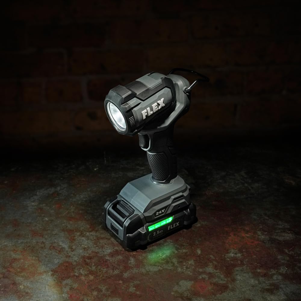 FLEX 24V work light compact design clipped to belt for hands-free use.