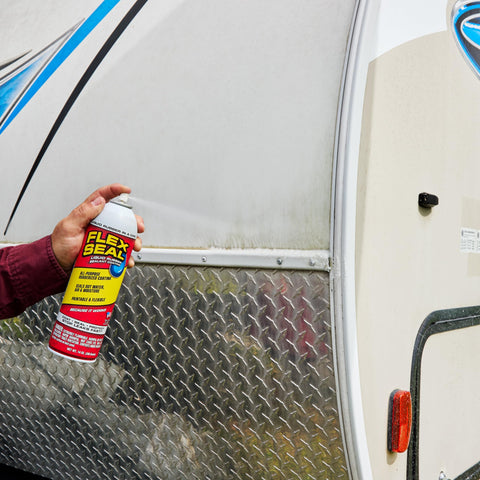 Gutter edge sealing with Flex Seal to prevent leaks.