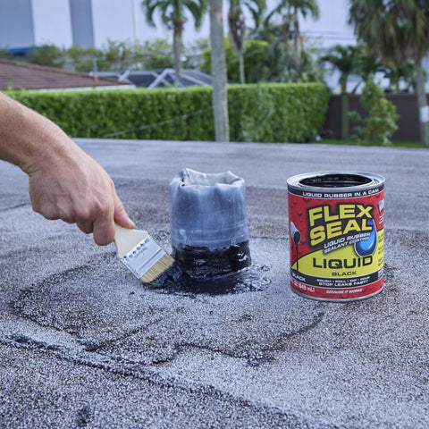 Roof seam treated with Flex Seal Liquid for flexible waterproof seal