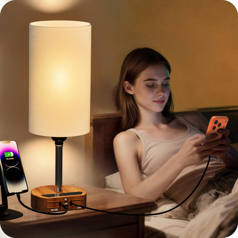 FlexTurtle bedside lamp with retractable cords keeps cables tidy for bed-side charging.