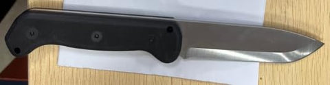 FLISSA drop-point knife ready for precise field prep in outdoor settings.