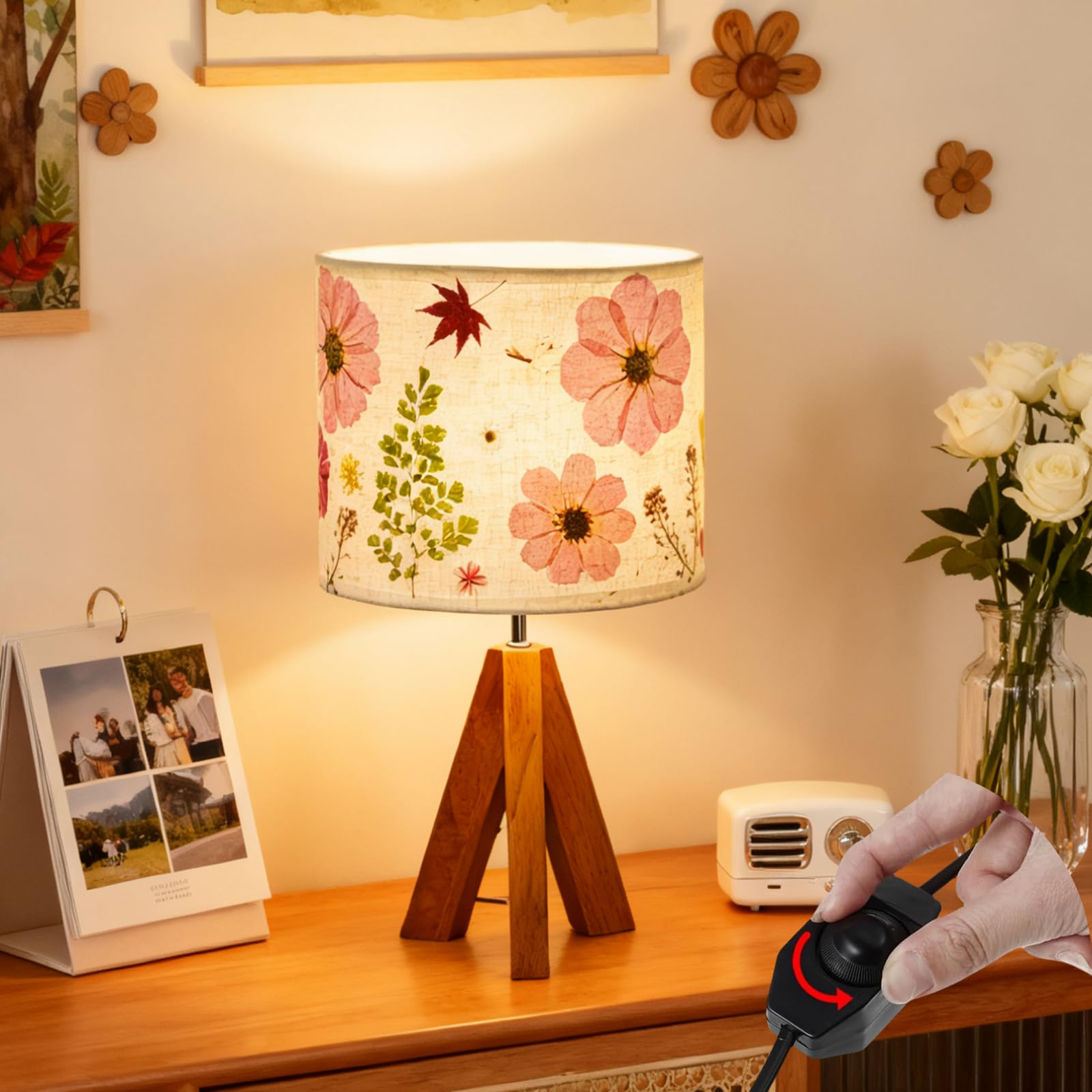 Floresita tripod lamp with wooden base showcases dried flowers for a cozy bedside glow