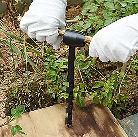FLOWERTEEN heavy-duty steel auger delivers durable performance in outdoor drilling tasks.
