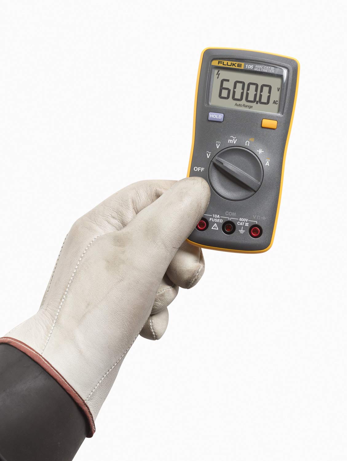 Fluke 106 held in hand during on-site wiring checks.