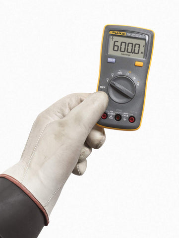 Fluke 106 held in hand during on-site wiring checks.