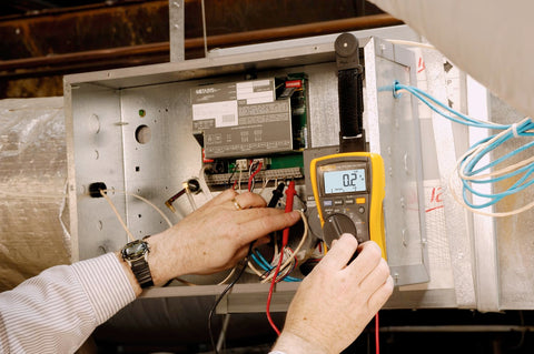 Fluke 116 HVAC multimeter carry-case illustrating compact field portability.