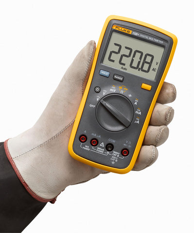 Fluke 15B+ test leads connected for precise voltage and current testing.