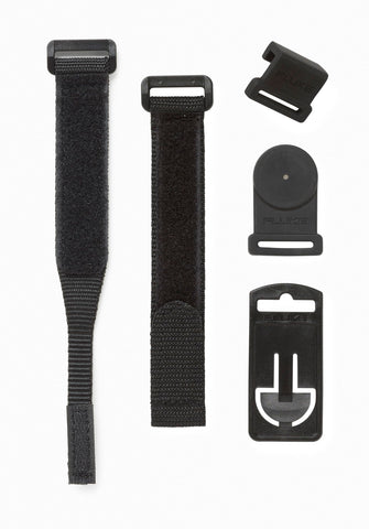 Fluke TPAK meter hanger magnet secures hands-free measurements on metal surfaces.