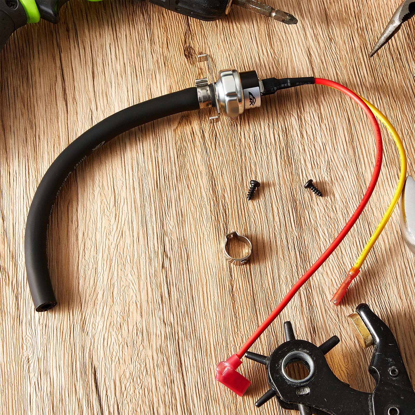 Flutesan pressure switch assembly parts including hose, screws, and clamp.