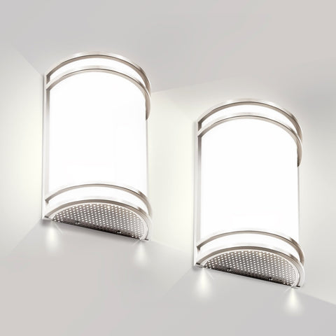 Flynix half-cylinder wall sconce in brushed nickel delivers warm ambient lighting.