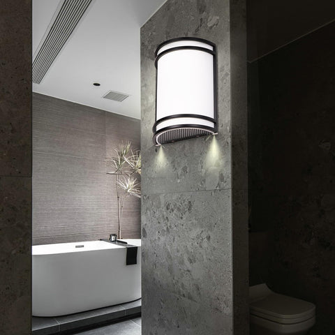 Flynix half-cylinder wall sconce side view; slim modern profile for living rooms.