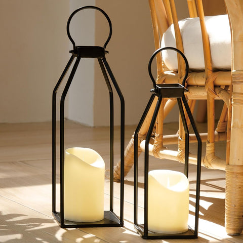 Fo32won ivory LED pillar candles add warm holiday glow.