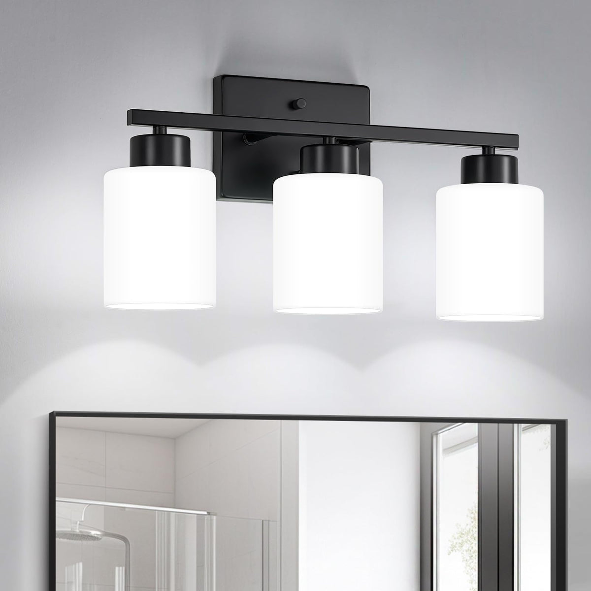 FonmYim black three-light vanity over mirror with milky frosted glass for soft illumination