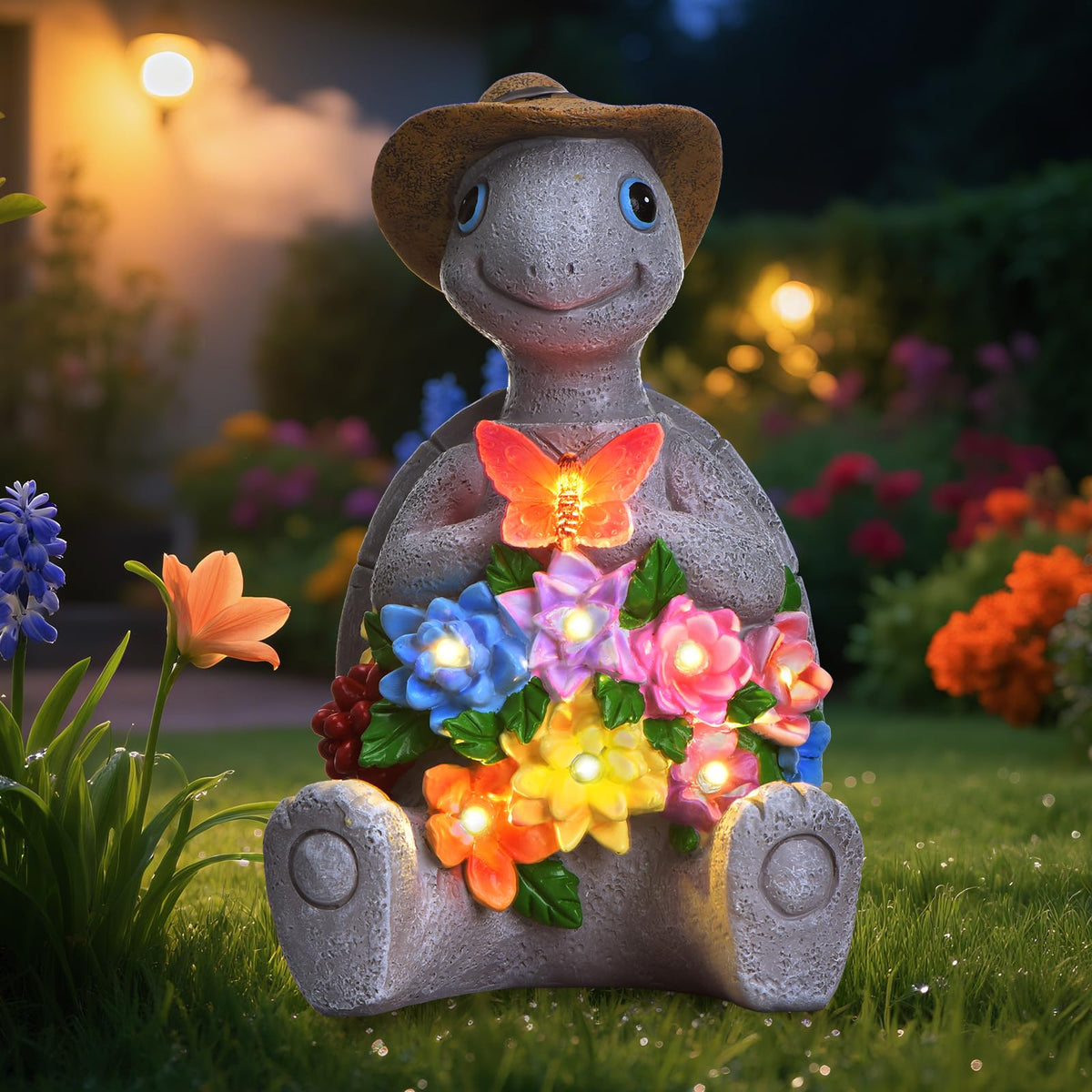 Footreal solar garden turtle with cowboy hat and butterfly adds whimsy to your yard.