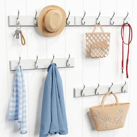 Forbena wall-mounted rack showing four hooks for hanging coats and bags.