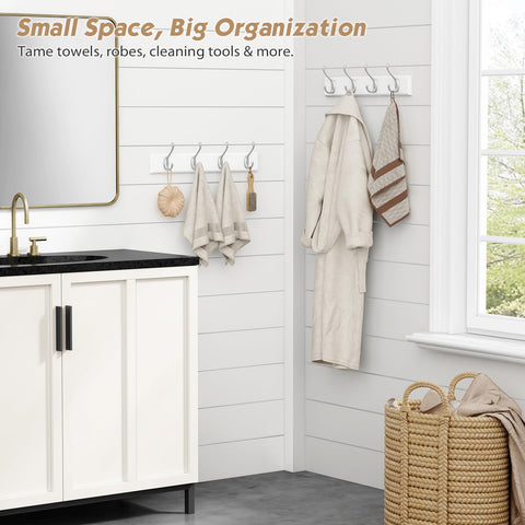 Forbena wall rack in entryway keeps coats and keys tidy.