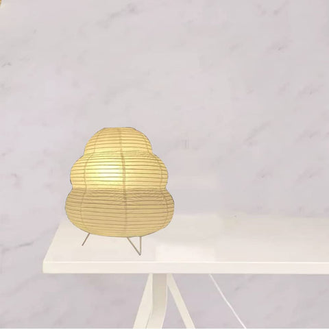 Fosinz Cute Paper Lamp on nightstand creates soft, safe lighting.
