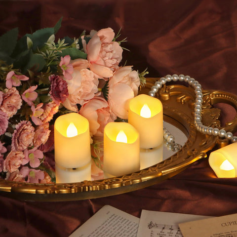 FreePower six-pack tealights arranged on a table create inviting centerpieces.
