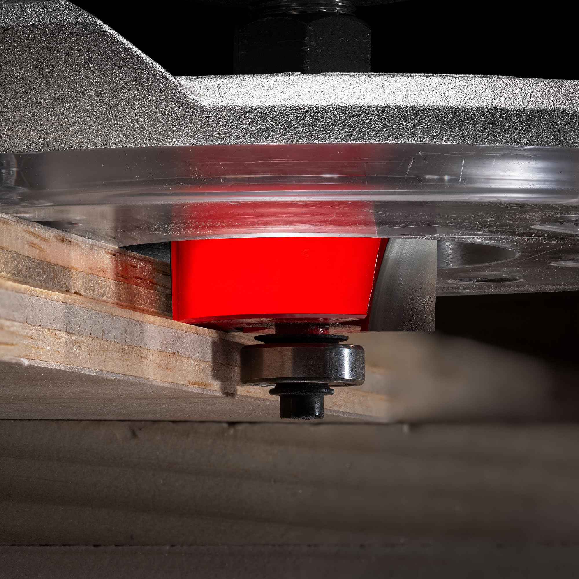 Freud router bit in use with handheld or table-mounted setup for rabbeting.