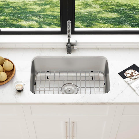 Frsmvati grid includes protectors to guard the sink and stabilize placement.