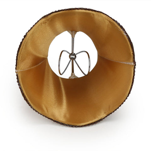 Fuloon clip-on lamp shade in coffee, soft lighting for cozy evenings.