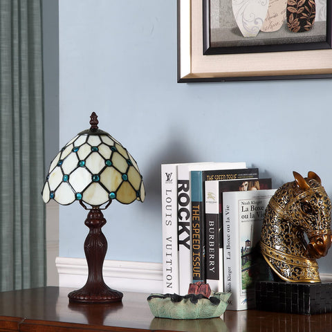 FUMAT Tiffany living room table lamp adds ambient decor on a side table.