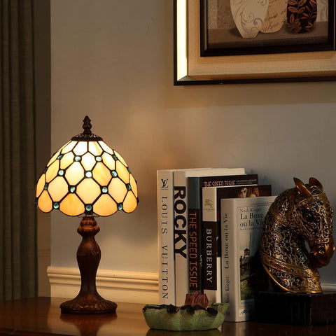 FUMAT Tiffany table lamp close view of stained glass shade highlighting colors.