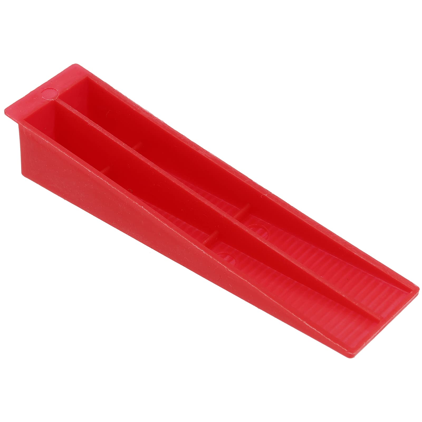 Red-textured wedges grip tiles firmly during laydown