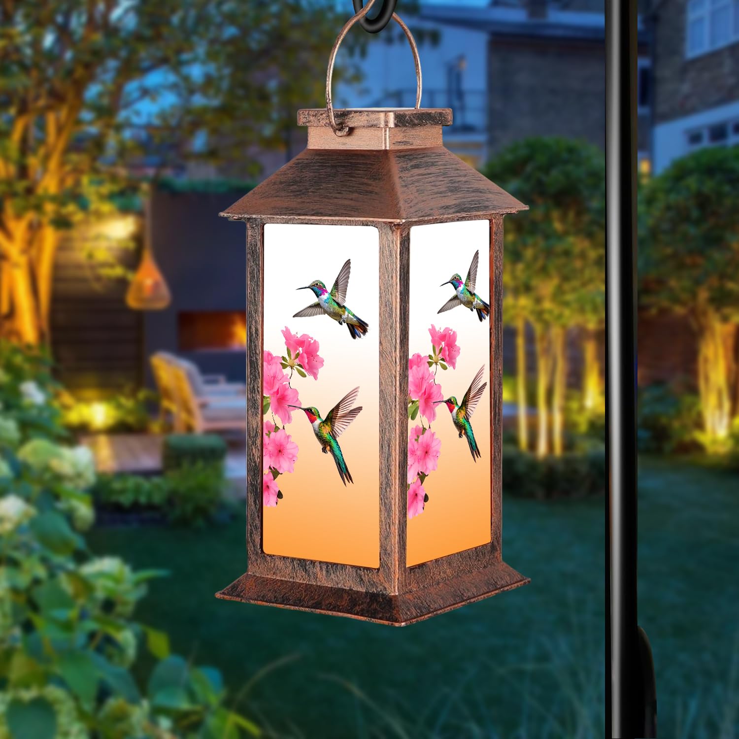 Fussion hummingbird lantern close-up shows delicate silhouette and warm glow