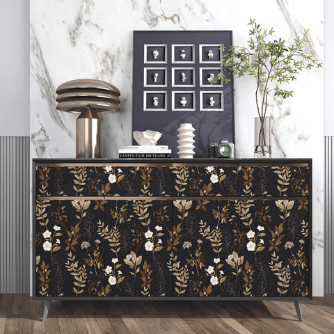 Fvlow wallpaper on a cabinet front adding an elegant gold-accented look