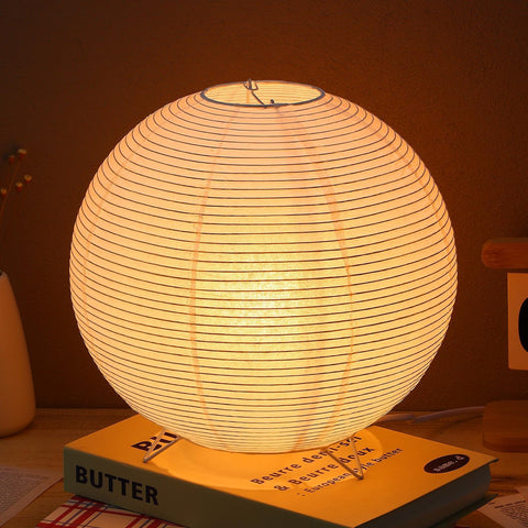 Gadpiparty desk lamp base view shows modern metal frame and paper shade for warm ambience.
