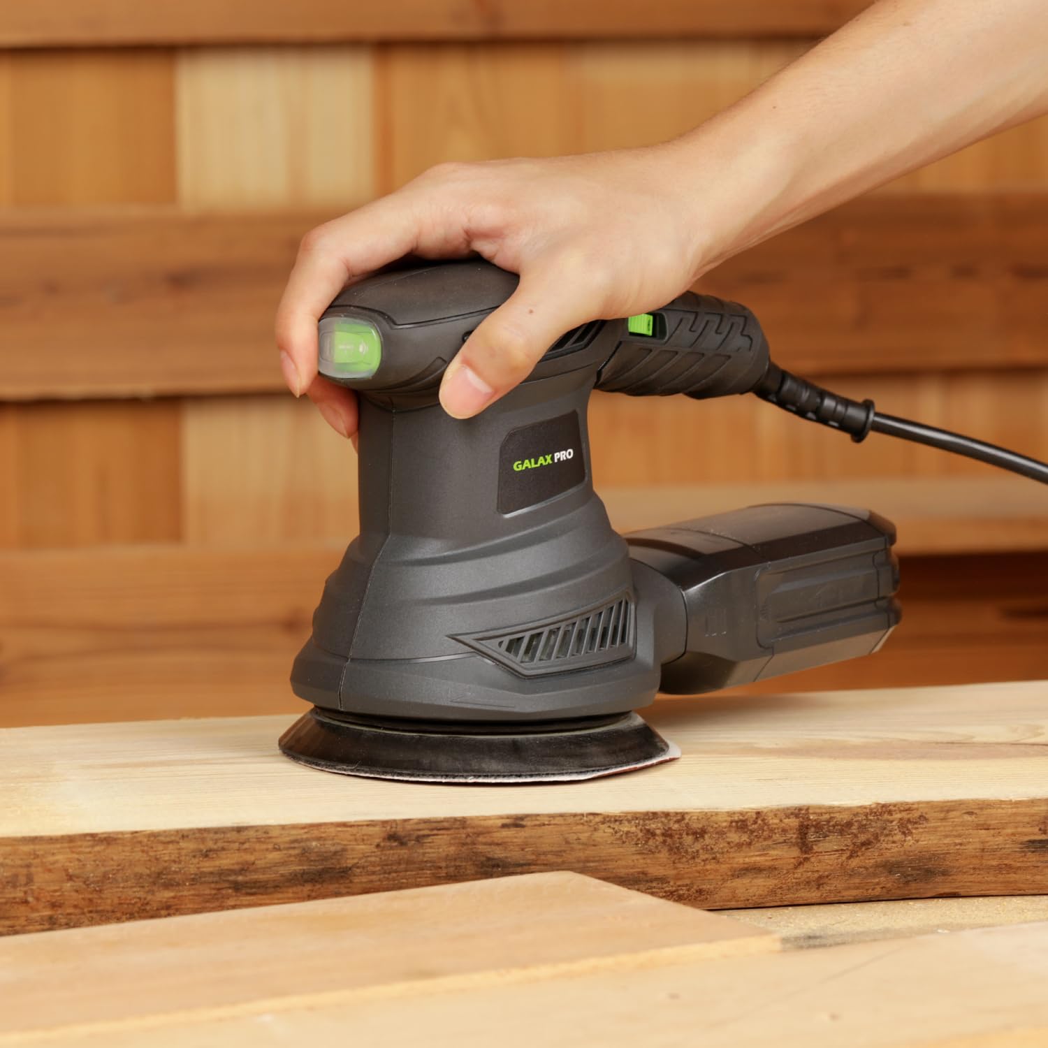 GALAX PRO 4.9-inch sanding pad in action on wooden surface.