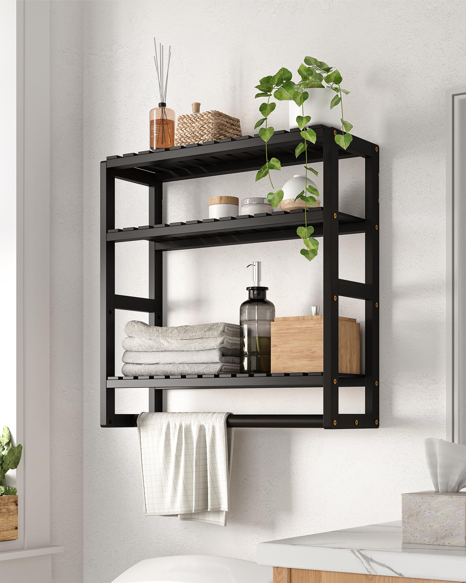 Galood over-toilet 3-tier black shelf provides compact towel and toilet paper storage.