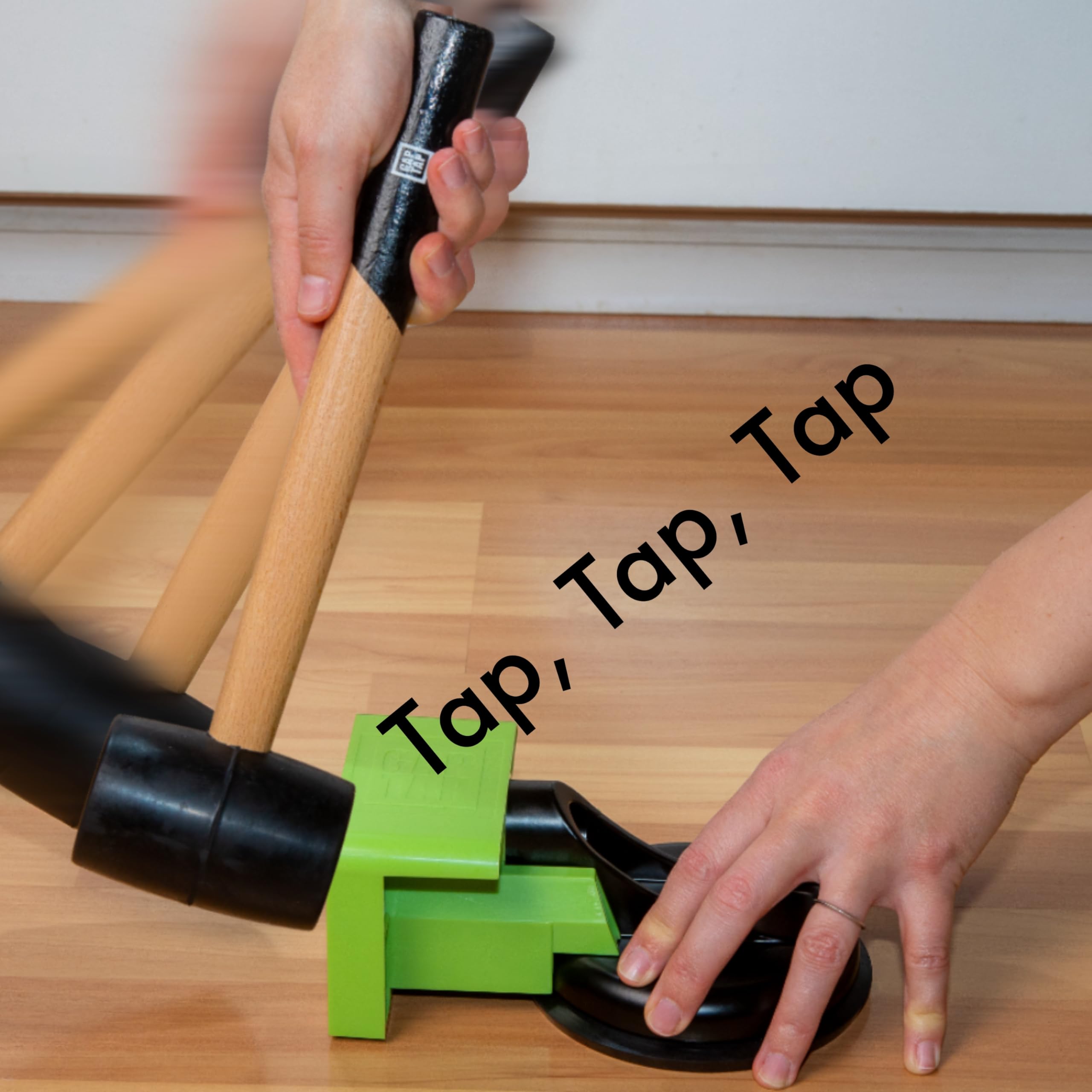 Gap Tap in action on laminate floor showing gap closure