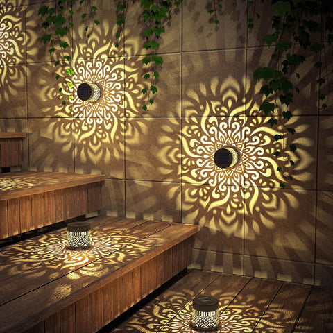 Gardencave solar fence light mounted on wall for backyard
