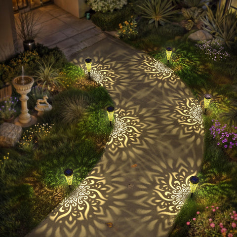 Gardencave solar lights with IP55 waterproofing for rain and snow on walkways.