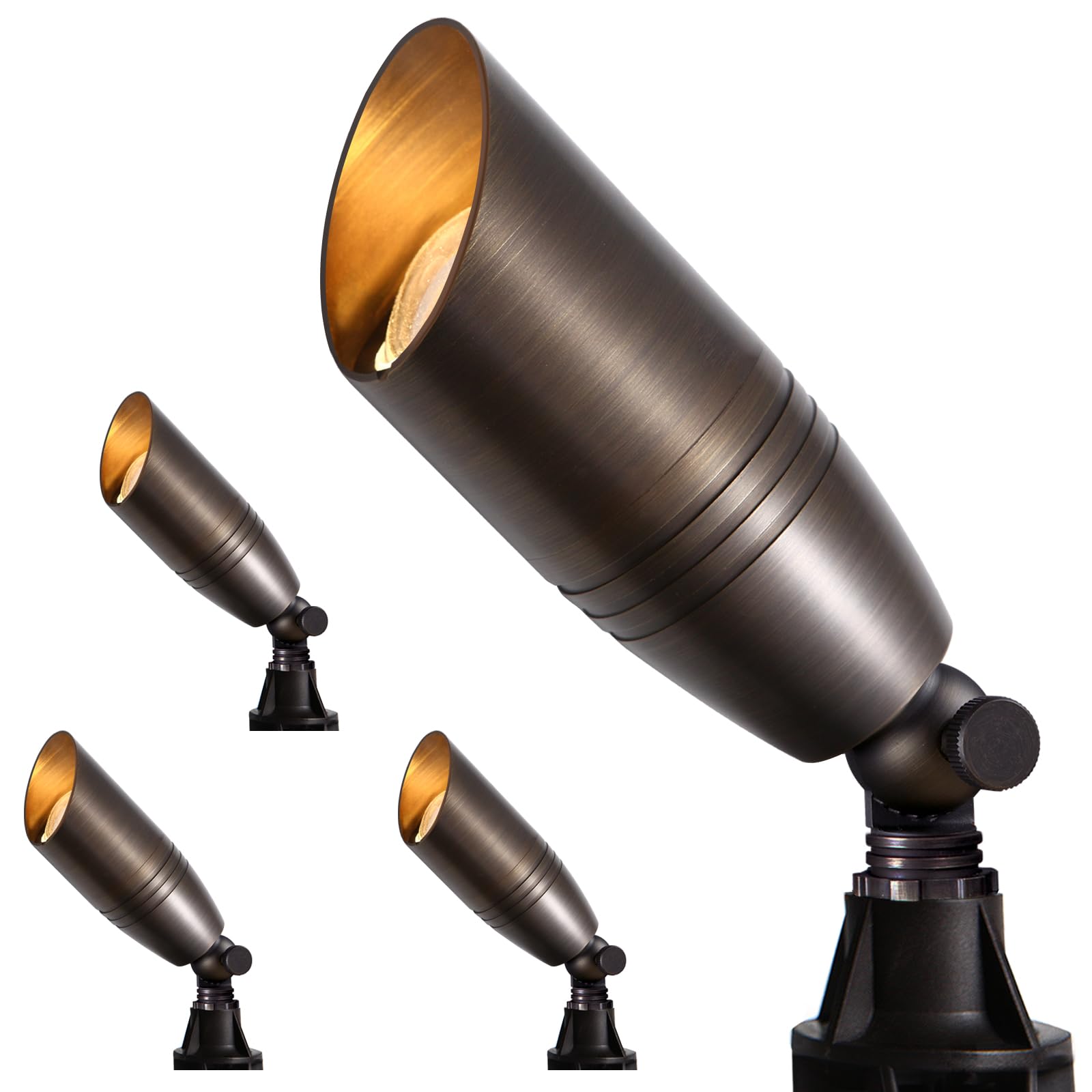 Gardencoin solid brass outdoor spotlight with bronze finish highlights architectural details.