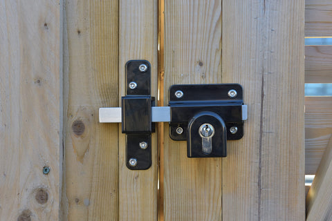 Gatemate gate lock with black finish installed on gate highlighting weatherproof look