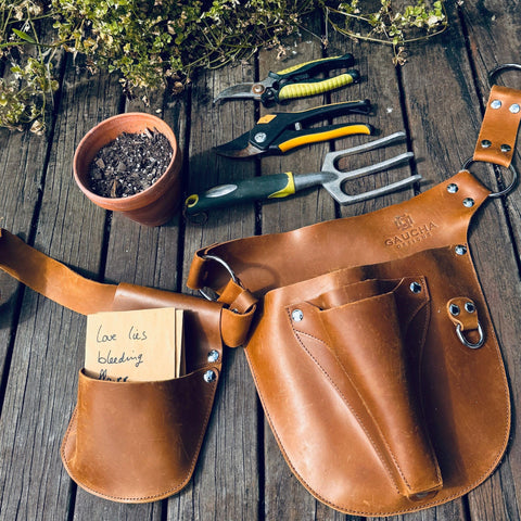 Gaucha Designs Leather Tool Belt in garden use, durable for daily wear.