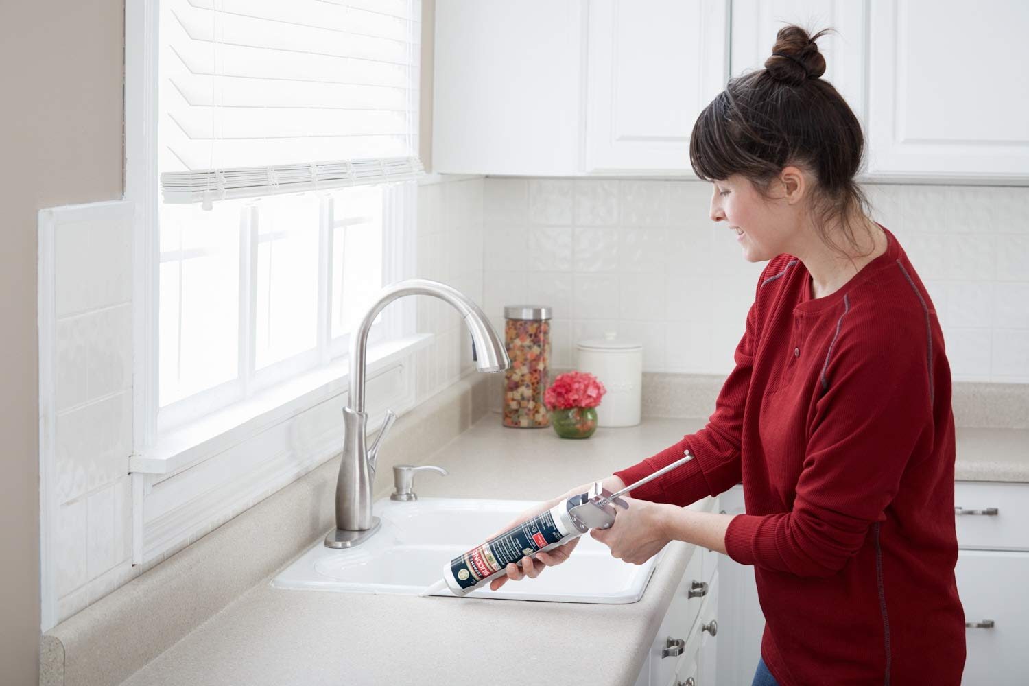 GE Supreme Silicone proves strong adhesion on tile and fixture joints.