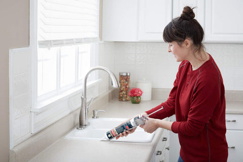 GE Supreme Silicone proves strong adhesion on tile and fixture joints.
