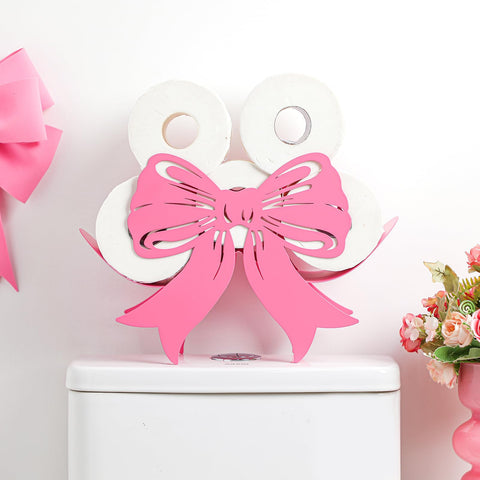 Geelin Bow metal toilet paper holder pink adds cute decor while keeping rolls accessible.