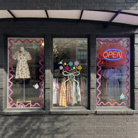 Generic LED Open Sign window display with slim profile keeps the glass view clear.